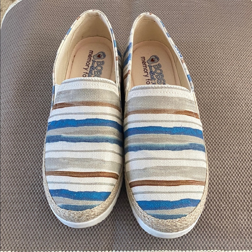 Woman’s Skechers Bobs Flexpadrille 3.0 Serene Sweetie striped slip-on shoes.